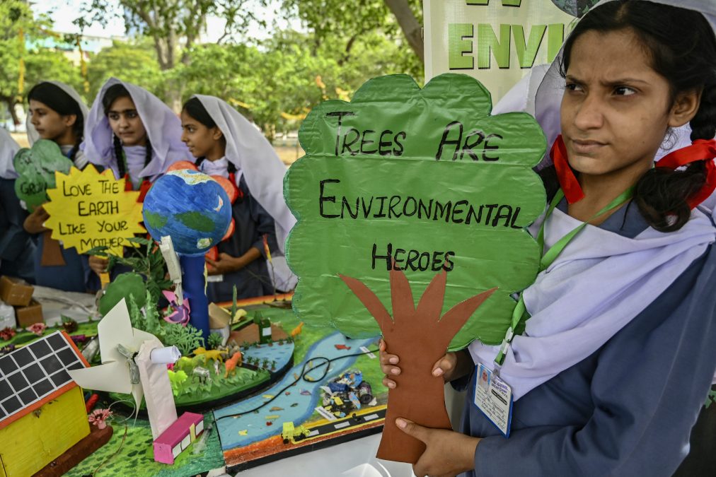 School children take part in an awareness campaign on the occasion of World Environment Day, in Karachi on June 5, 2024. (Photo by Asif HASSAN / AFP)