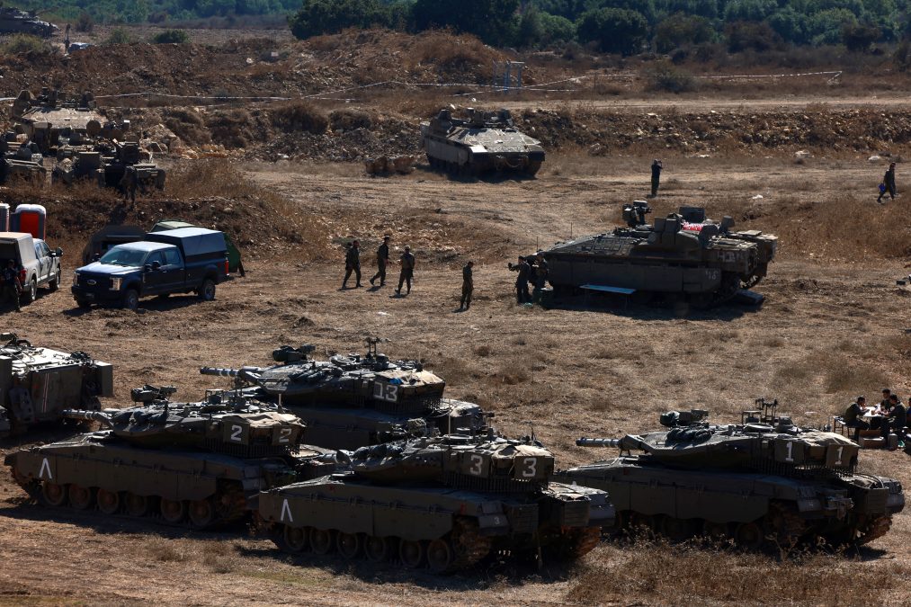 Israeli soldiers deployed in the Upper Galilee region of northern Israel near the border with Lebanon were preparing for ground invasion. (AFP)