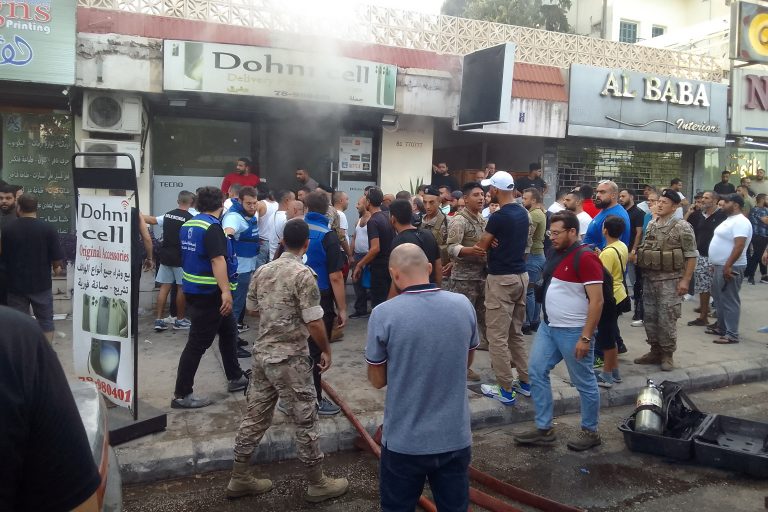 People and first responders gather at the scene of a reported device explosion in Saida in southern Lebanon on September 18, 2024. A second wave of device explosions hit Lebanon after Tuesday's terror attack blamed on Israel. (AFP)