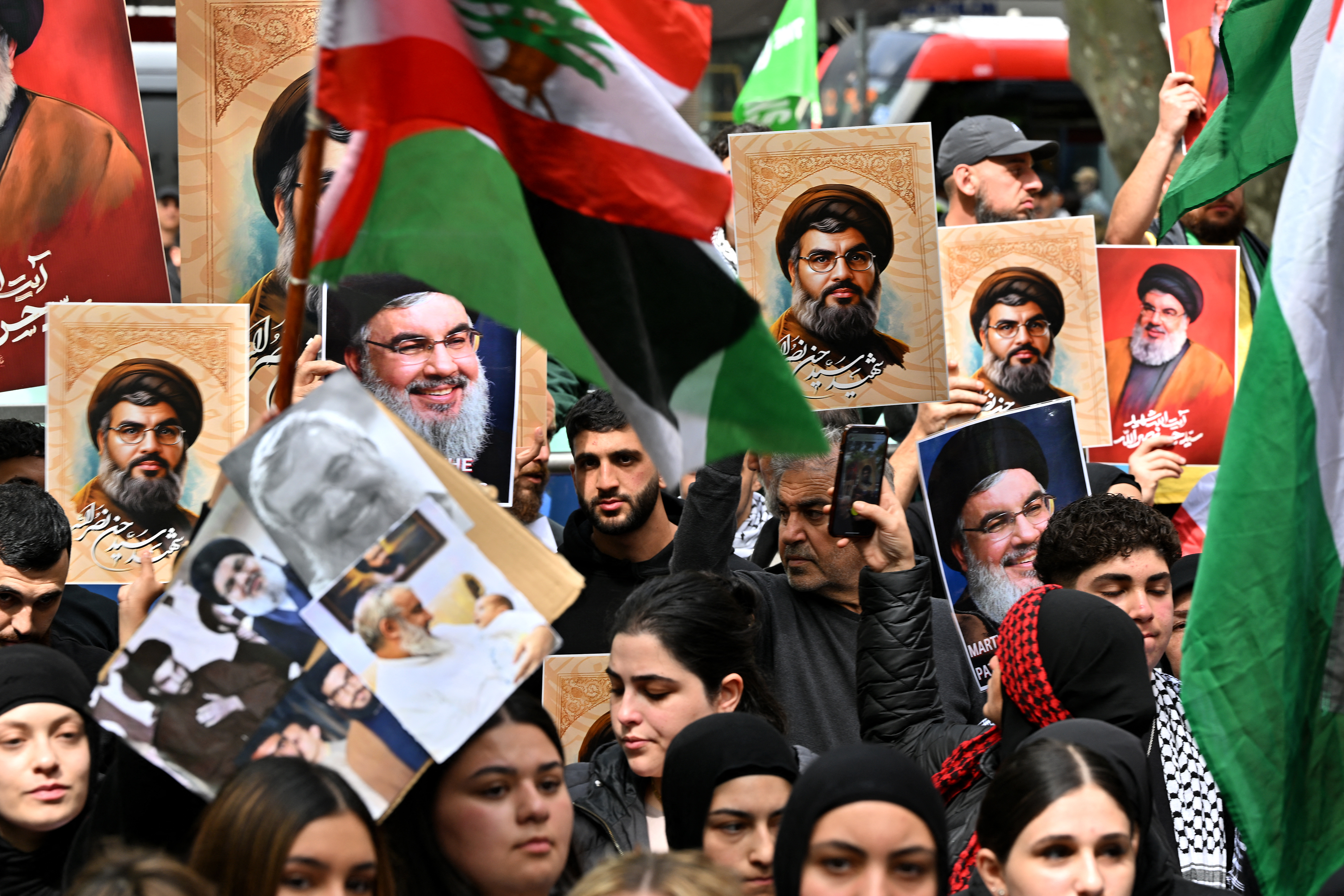 Demonstrators mourn the death of Hassan Nasrallah, late leader of the Lebanese group Hezbollah, at a protest rally in the central business district of Sydney on September 29, 2024. (AFP)