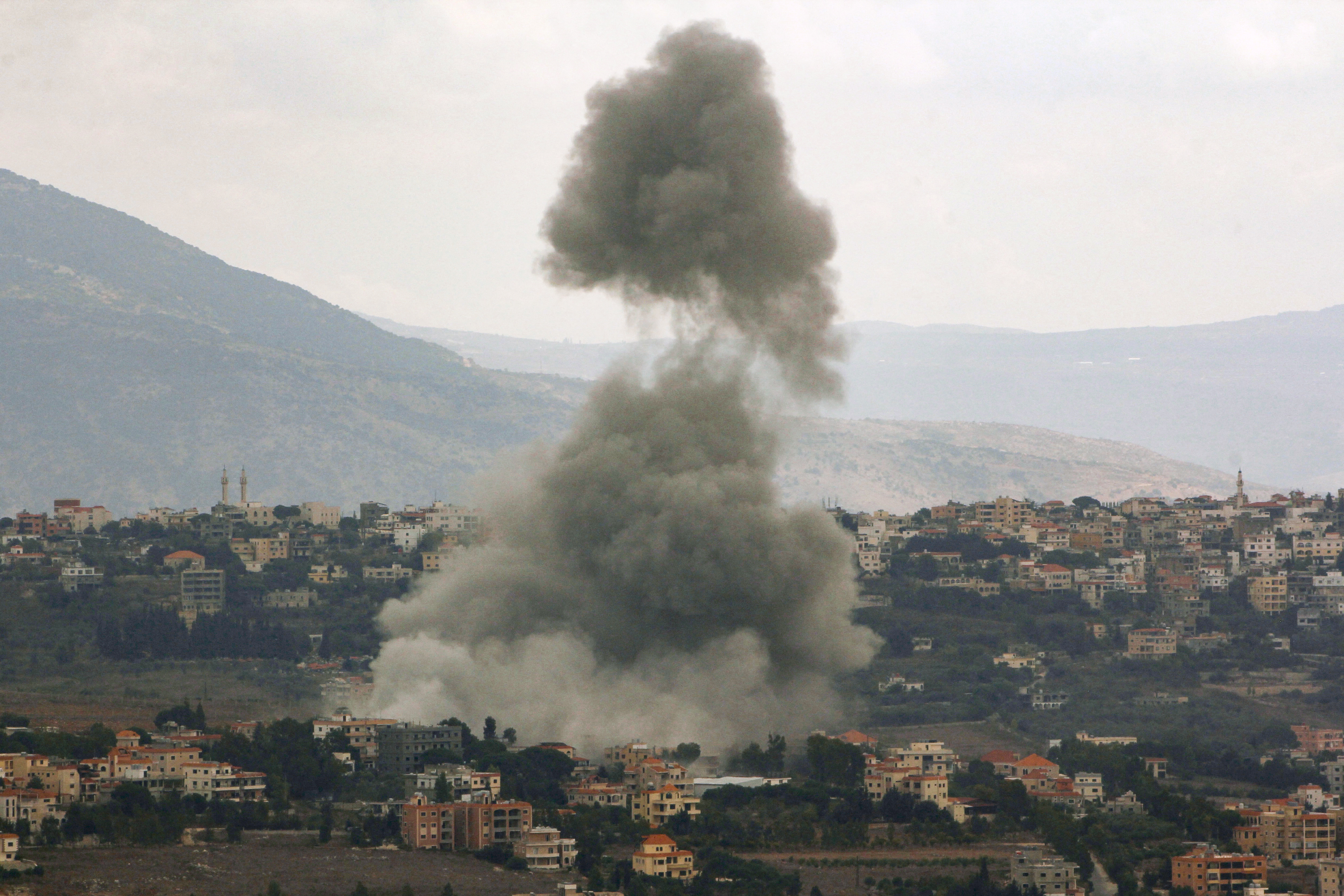 Smoke billows from the site of an Israeli air strike in the Lebanese village of Khiam, near the Lebanon-Israel border, on September 23, 2024. The Israeli military vowed to carry out more "extensive and precise" strikes against the Lebanese group Hezbollah. (AFP)