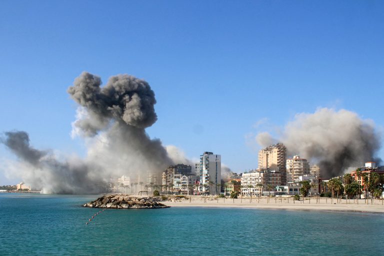 Smoke billows from the site of Israeli airstrikes on a neighborhood in the southern Lebanese city of Tyre. (AFP)