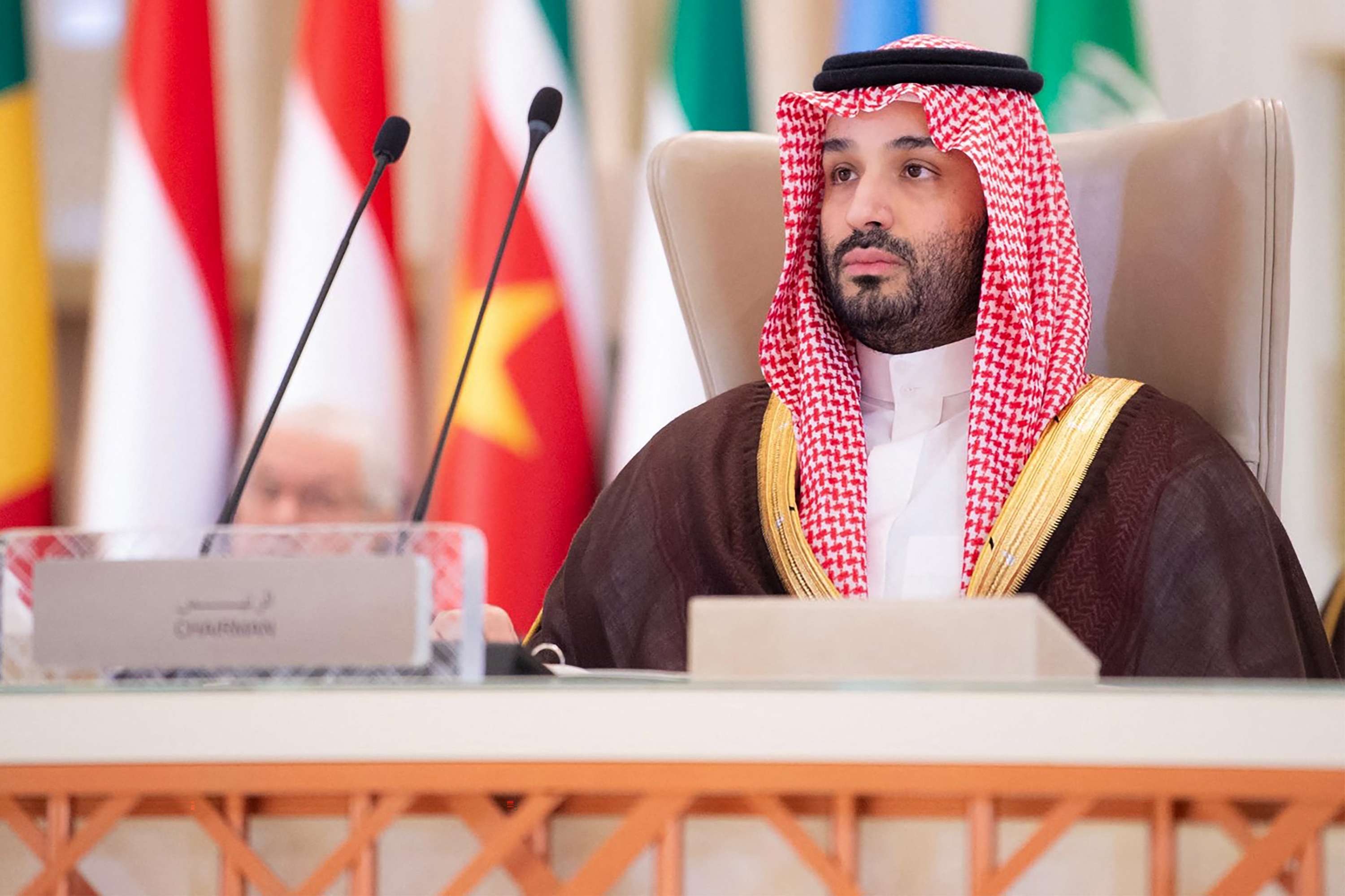 Saudi Crown Prince Mohammed bin Salman addressing the joint extraordinary leaders summit of the Organization of Islamic Cooperation (OIC) and the Arab League in Riyadh on Monday. (SPA/AFP)