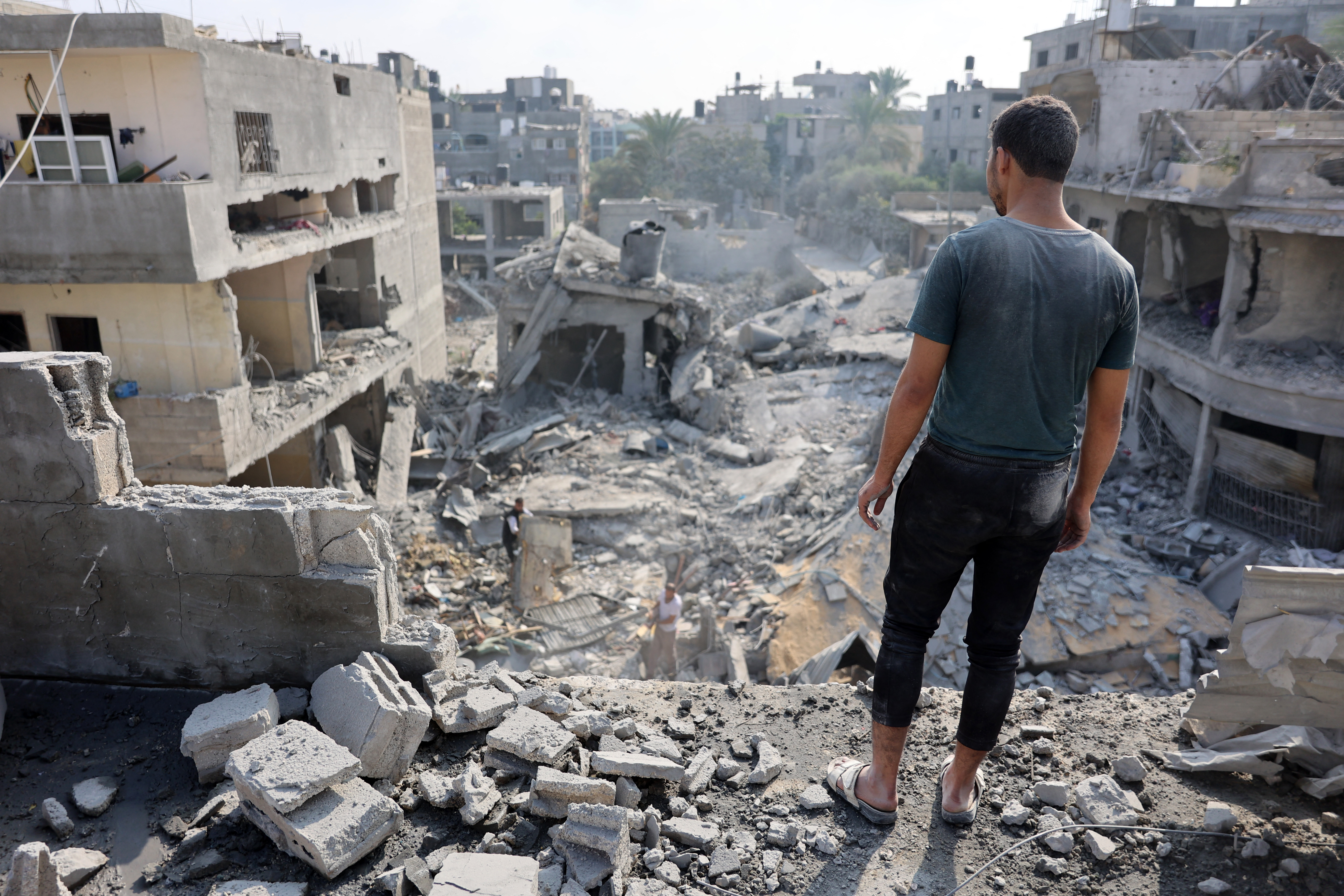 A Palestinian man stares at the rubble of the Alloush family's house, levelled in an Israeli strike in Jabalia in the northern Gaza Strip on November 10, 2024. (AFP)